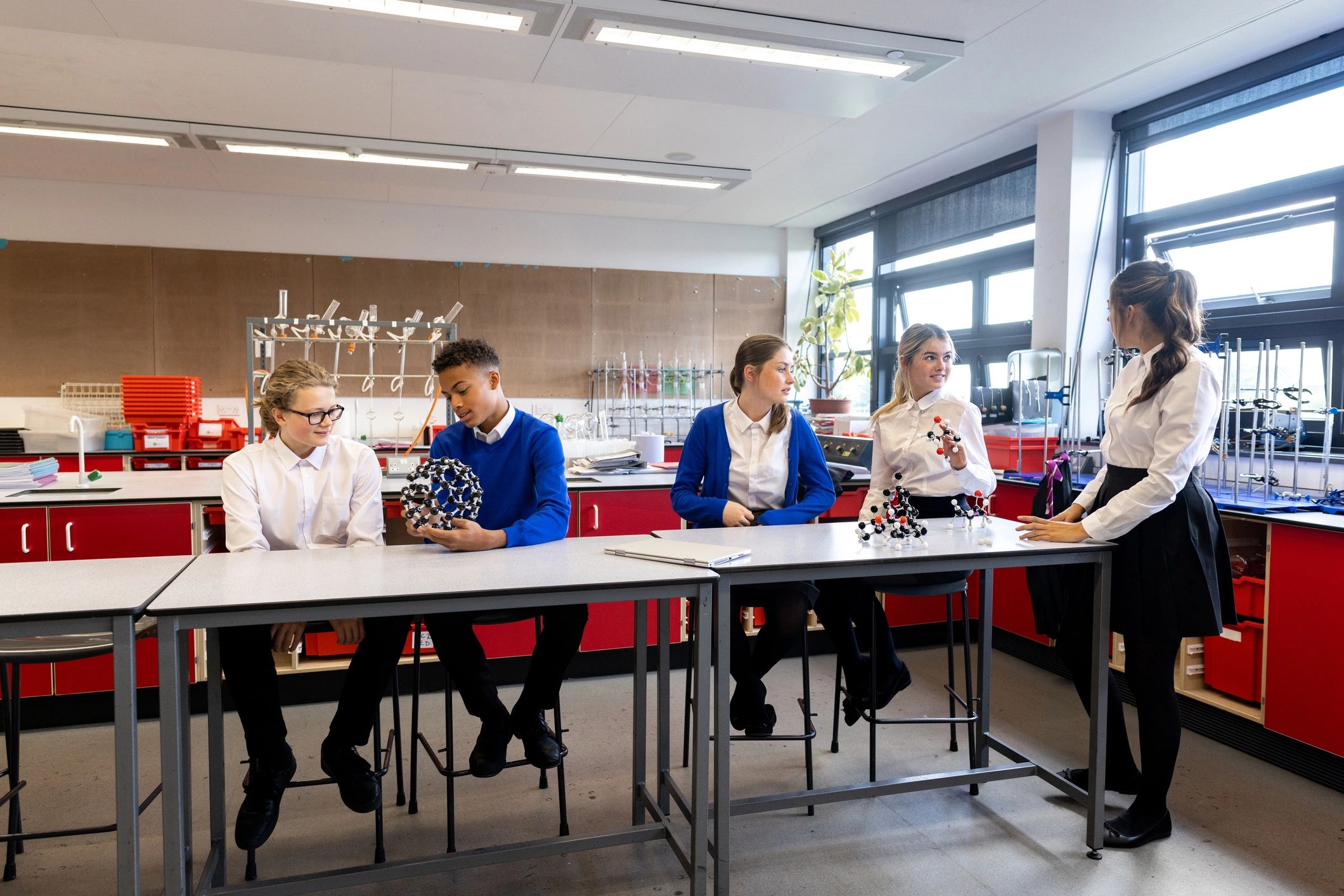 Students engaging with a science learning experience