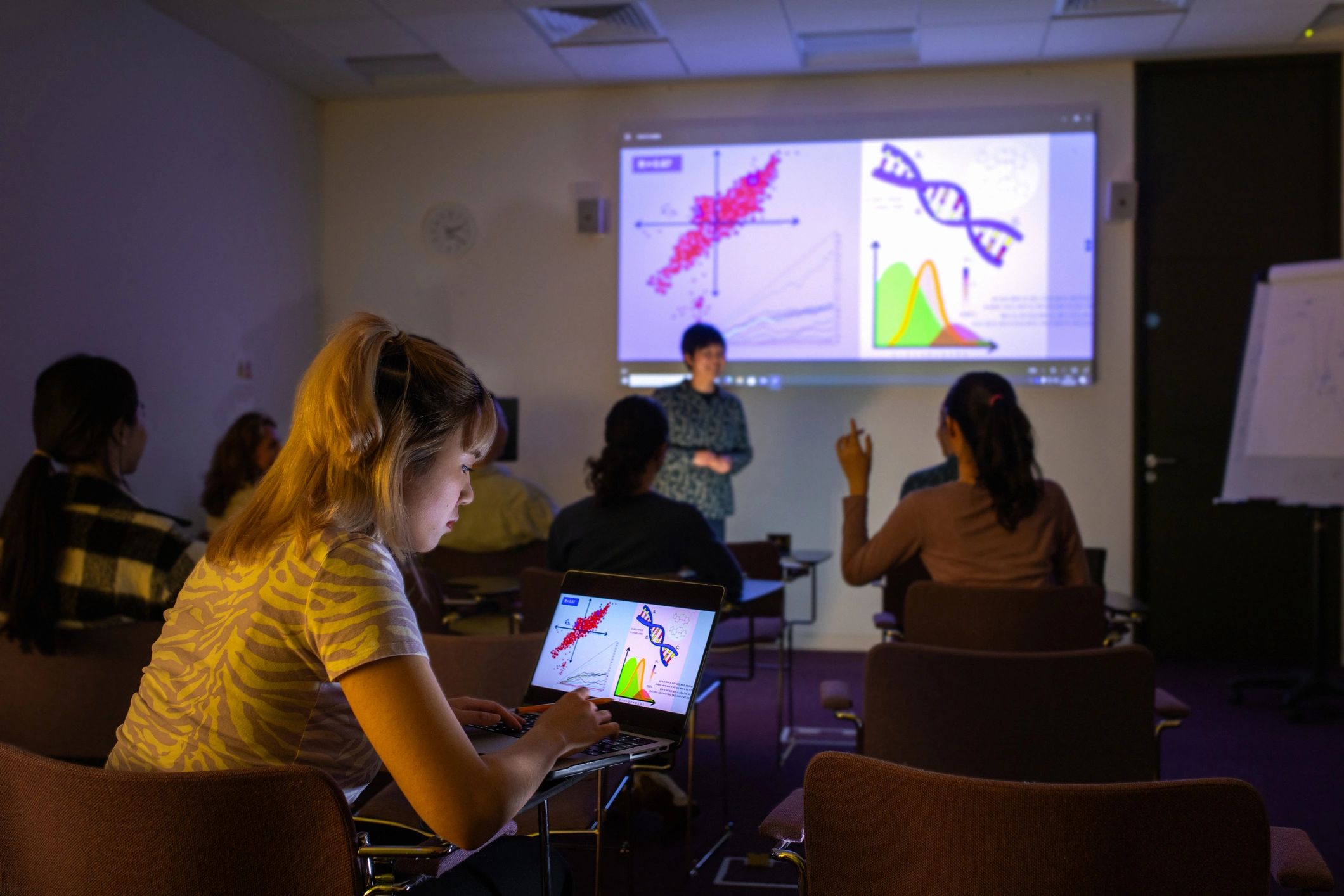 University students viewing scientific data presentation